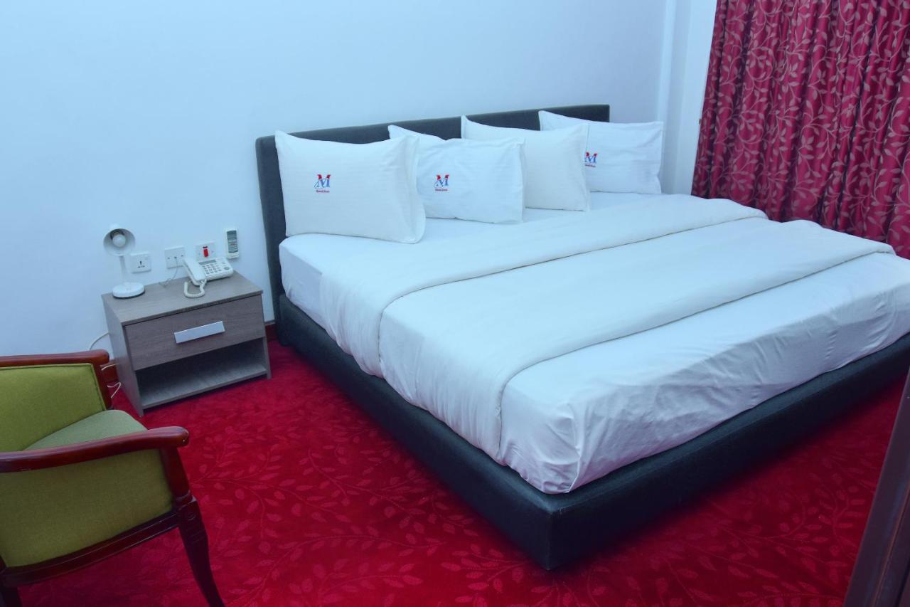 Mawuli Hotel Obuasi Bagian luar foto